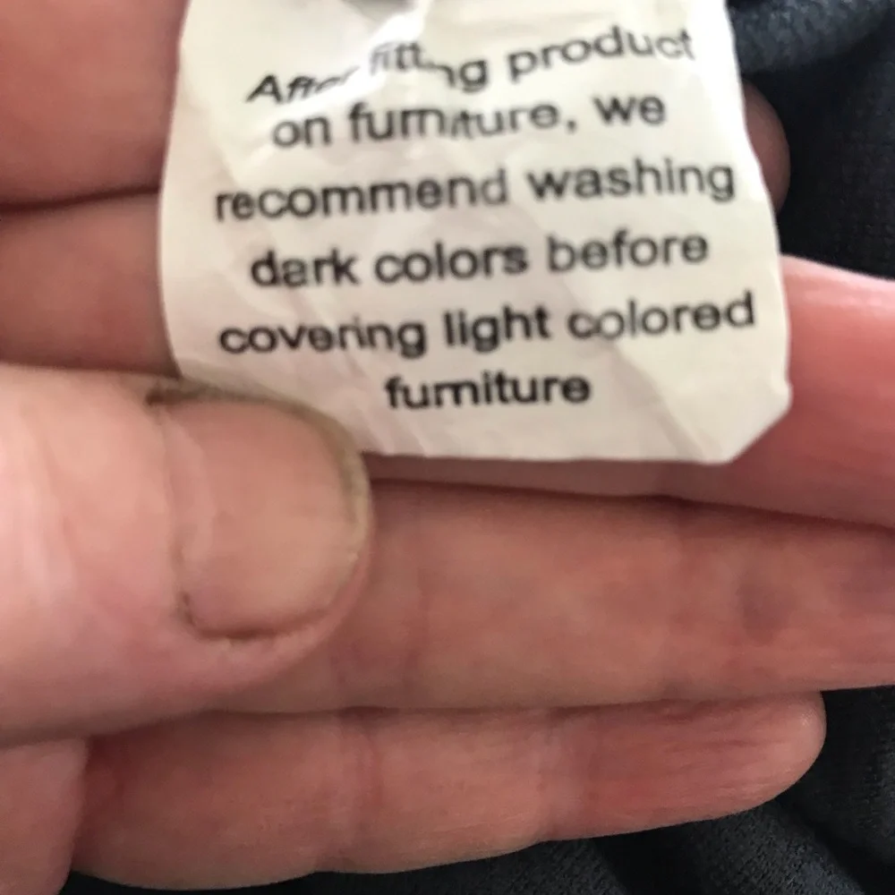 Navy one piece stretch loveseat slipcover. In good used condition.